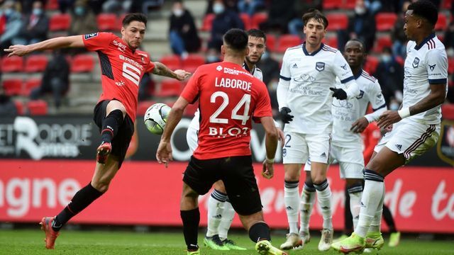Rennes' French midfielder Jonas Martin kicks the ball during the French L1 football match between Stade Rennais Football Club and FC Girondins de Bordeaux, at Roazhon Park Stadium in Rennes, northwestern France on January 16, 2022.