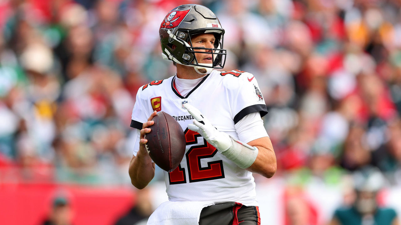 TAMPA, FLORIDA - JANUARY 16: Tom Brady #12 of the Tampa Bay Buccaneers throws a pass against the Philadelphia Eagles during the first quarter in the NFC Wild Card Playoff game at Raymond James Stadium on January 16, 2022 in Tampa, Florida.