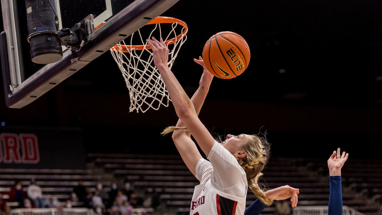 PALO ALTO, CA - DECEMBER 15: Stanford Cardinal forward Cameron Brink (22) fights for the rebound during the college womens basketball game between the UC Davis Aggies and Stanford Cardinal on December 15, 2021 at Maples Pavilion in Palo Alto, CA.