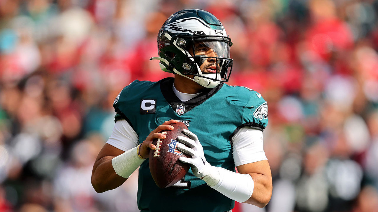 TAMPA, FLORIDA - JANUARY 16: Jalen Hurts #1 of the Philadelphia Eagles looks to throw a pass against the Tampa Bay Buccaneers during the first quarter in the NFC Wild Card Playoff game at Raymond James Stadium on January 16, 2022 in Tampa, Florida.