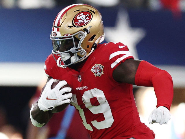 ARLINGTON, TEXAS - JANUARY 16: Deebo Samuel #19 of the San Francisco 49ers carries the ball against the Dallas Cowboys during the second quarter in the NFC Wild Card Playoff game at AT&T Stadium on January 16, 2022 in Arlington, Texas.
