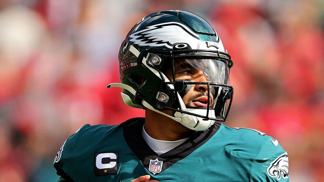 TAMPA, FLORIDA - JANUARY 16: Jalen Hurts #1 of the Philadelphia Eagles looks to throw a pass against the Tampa Bay Buccaneers during the first quarter in the NFC Wild Card Playoff game at Raymond James Stadium on January 16, 2022 in Tampa, Florida.