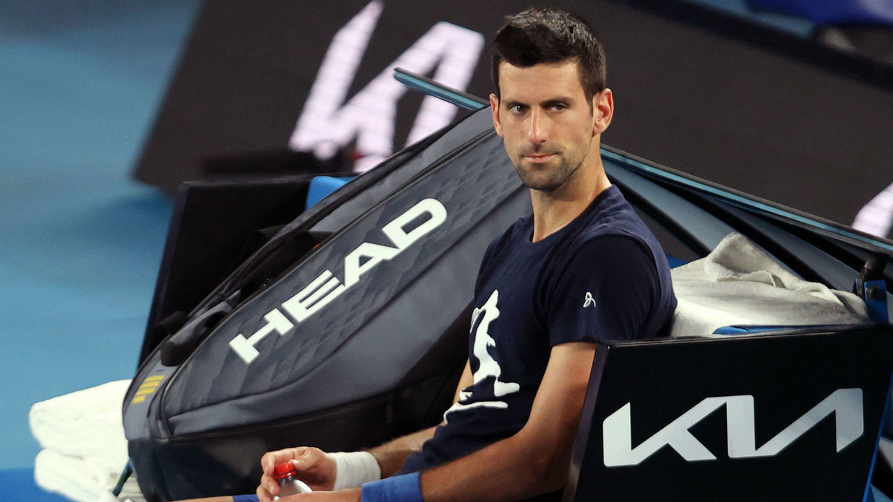 TOPSHOT - Novak Djokovic of Serbia attends a practice session ahead of the Australian Open tennis tournament in Melbourne on January 14, 2022. - --IMAGE RESTRICTED TO EDITORIAL USE - NO COMMERCIAL USE--