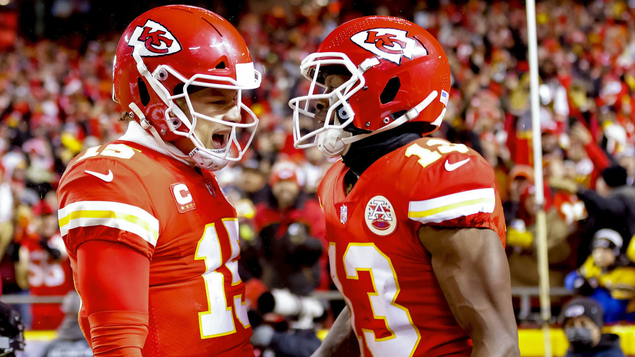 KANSAS CITY, MISSOURI - JANUARY 16: Byron Pringle #13 of the Kansas City Chiefs celebrates scoring a touchdown with teammate Patrick Mahomes #15 in the second quarter of the game against the Pittsburgh Steelers in the NFC Wild Card Playoff game at Arrowhead Stadium on January 16, 2022 in Kansas City, Missouri.