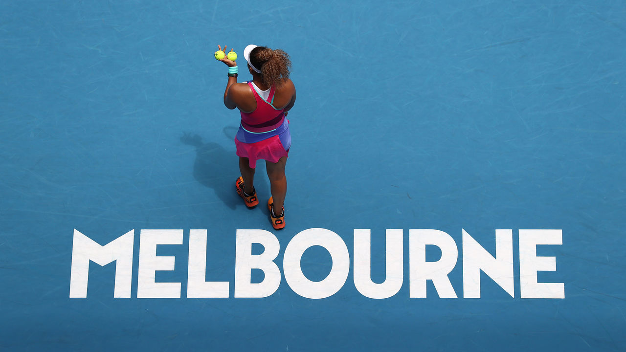 MELBOURNE, AUSTRALIA - JANUARY 17: Naomi Osaka of Japan prepares to serve in her first round singles match against Camila Osorio of Colombia during day one of the 2022 Australian Open at Melbourne Park on January 17, 2022 in Melbourne, Australia.