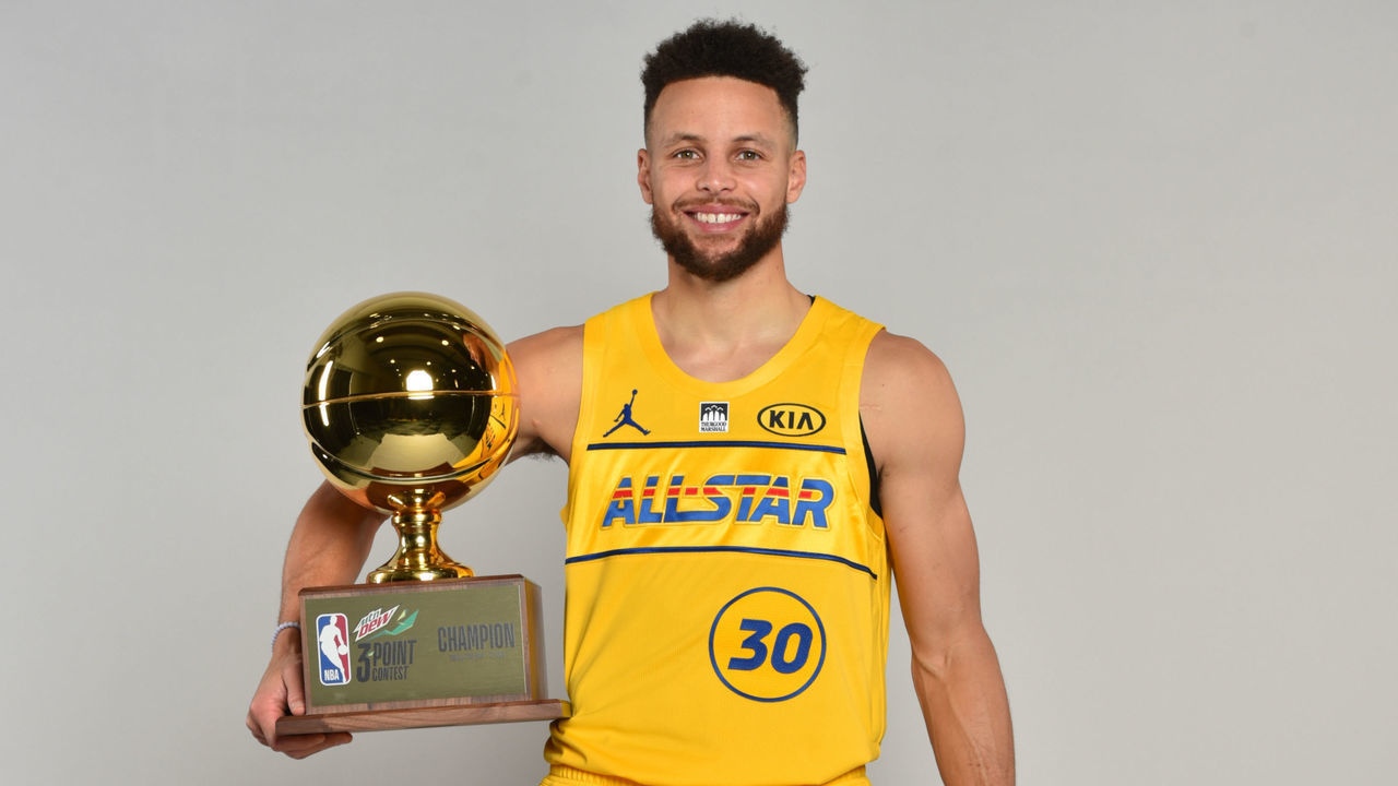ATLANTA, GA - MARCH 07: Stephen Curry #30 of the Golden State Warriors poses with the MTN Dew 3-Point Trophy after winning the MTN Dew 3-Point Contest during the NBA All-Star Game 2021 on March 7, 2021 at State Farm Arena in Atlanta, Georgia. Mandatory Copyright Notice: Copyright 2021 NBAE