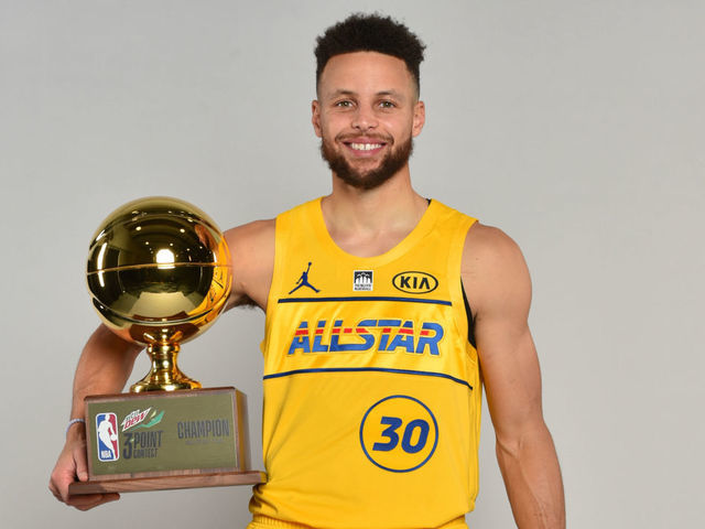 ATLANTA, GA - MARCH 07: Stephen Curry #30 of the Golden State Warriors poses with the MTN Dew 3-Point Trophy after winning the MTN Dew 3-Point Contest during the NBA All-Star Game 2021 on March 7, 2021 at State Farm Arena in Atlanta, Georgia. Mandatory Copyright Notice: Copyright 2021 NBAE