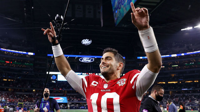 ARLINGTON, TEXAS - JANUARY 16: Jimmy Garoppolo #10 of the San Francisco 49ers walks off the field after defeating the Dallas Cowboys 23-17 in the NFC Wild Card Playoff game at AT&T Stadium on January 16, 2022 in Arlington, Texas.