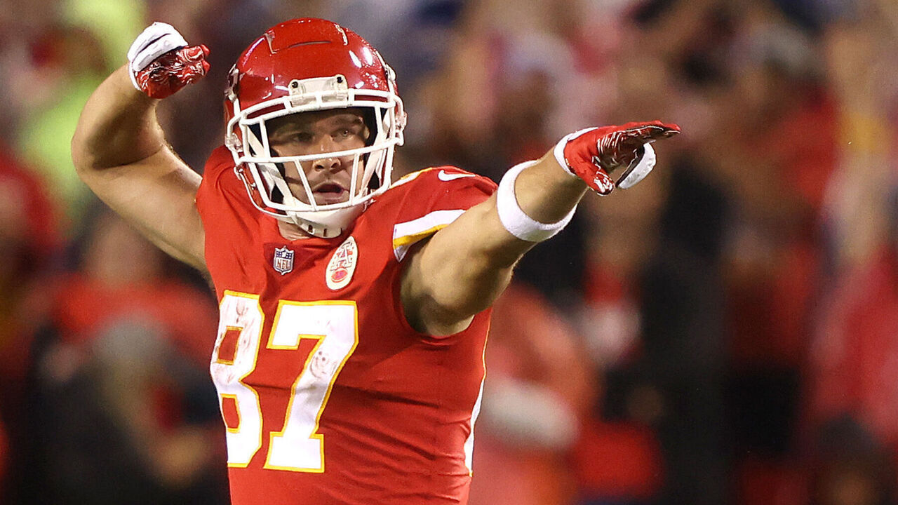 KANSAS CITY, MISSOURI - OCTOBER 10: Travis Kelce #87 of the Kansas City Chiefs motions first down after making a pass reception during the second half of a game against the Buffalo Bills at Arrowhead Stadium on October 10, 2021 in Kansas City, Missouri.