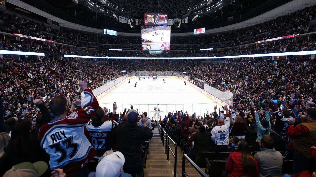 DENVER, COLORADO - NOVEMBER 22: Fans of the Colorado Avalanche cheer against the Ottawa Senators at Ball Arena on November 22, 2021 in Denver, Colorado.