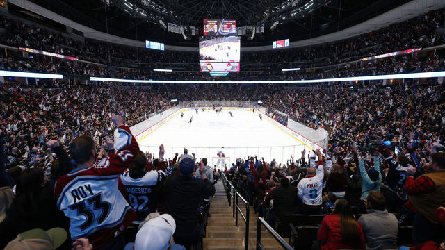 DENVER, COLORADO - NOVEMBER 22: Fans of the Colorado Avalanche cheer against the Ottawa Senators at Ball Arena on November 22, 2021 in Denver, Colorado.
