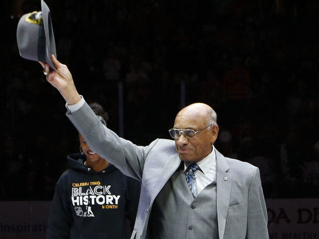 ANAHEIM, CA - FEBRUARY 25: Former NHL player, Willie O'Ree waves to the crowd during a pre-game ceremony prior to the opening face-off between the Anaheim Ducks and the Edmonton Oilers at Honda Center on February 25, 2020 in Anaheim, California.