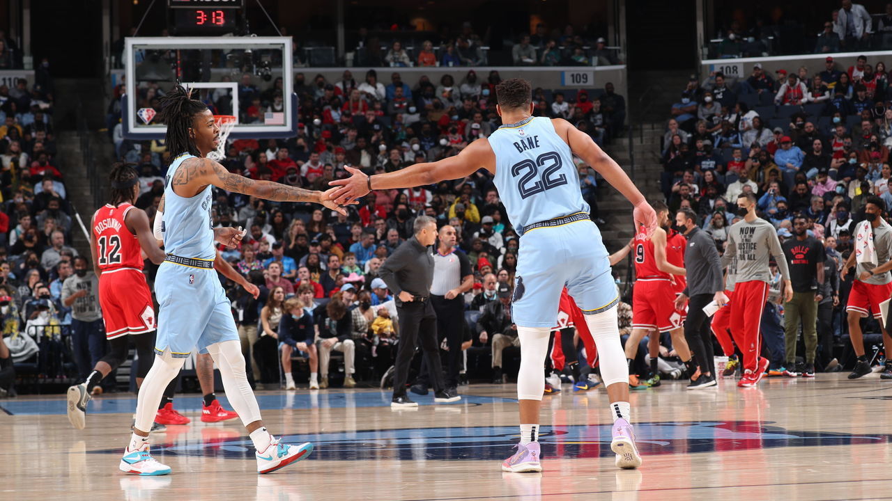 MEMPHIS, TN - JANUARY 17: Ja Morant #12 and Desmond Bane #22 of the Memphis Grizzlies celebrate during a game against the Chicago Bulls on January 17, 2022 at FedExForum in Memphis, Tennessee. Mandatory Copyright Notice: Copyright 2022 NBAE