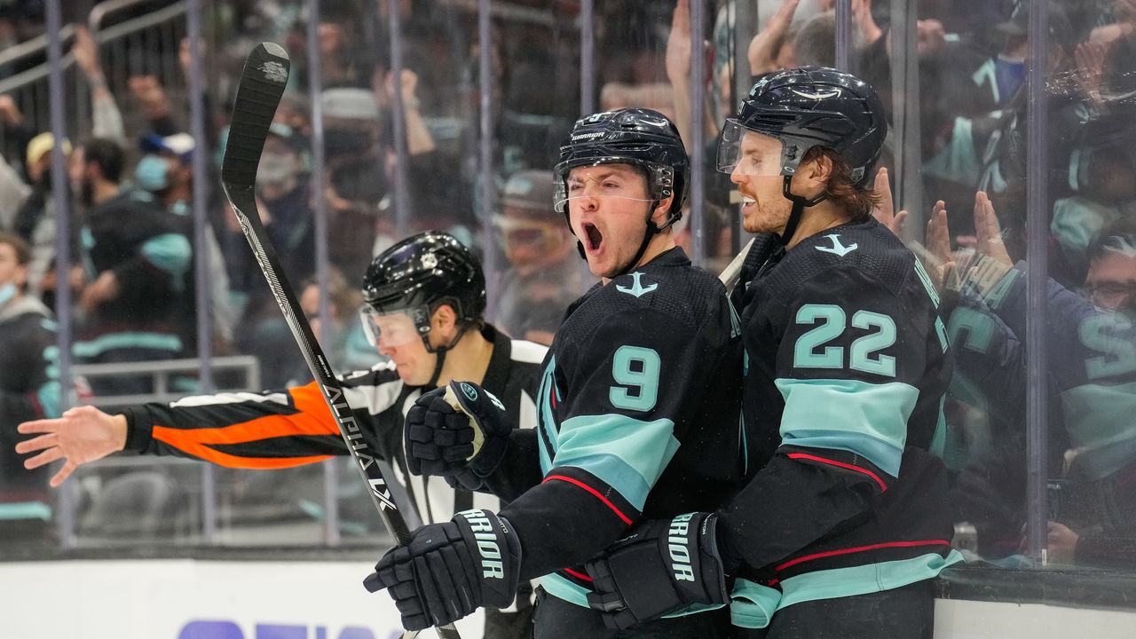 SEATTLE, WASHINGTON - JANUARY 17: Ryan Donato #9 of the Seattle Kraken celebrates with Mason Appleton #22 after scoring a goal against the Chicago Blackhawks to tie the game 2-2 during the second period at Climate Pledge Arena on January 17, 2022 in Seattle, Washington.