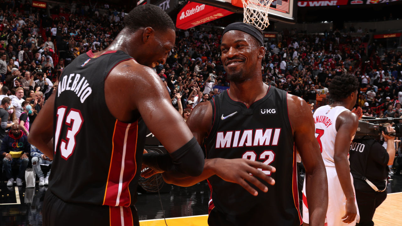 MIAMI, FL - JANUARY 17: Jimmy Butler #22 hi-fives Bam Adebayo #13 of the Miami Heat after the game against the Toronto Raptors on January 17, 2022 at FTX Arena in Miami, Florida. Mandatory Copyright Notice: Copyright 2022 NBAE