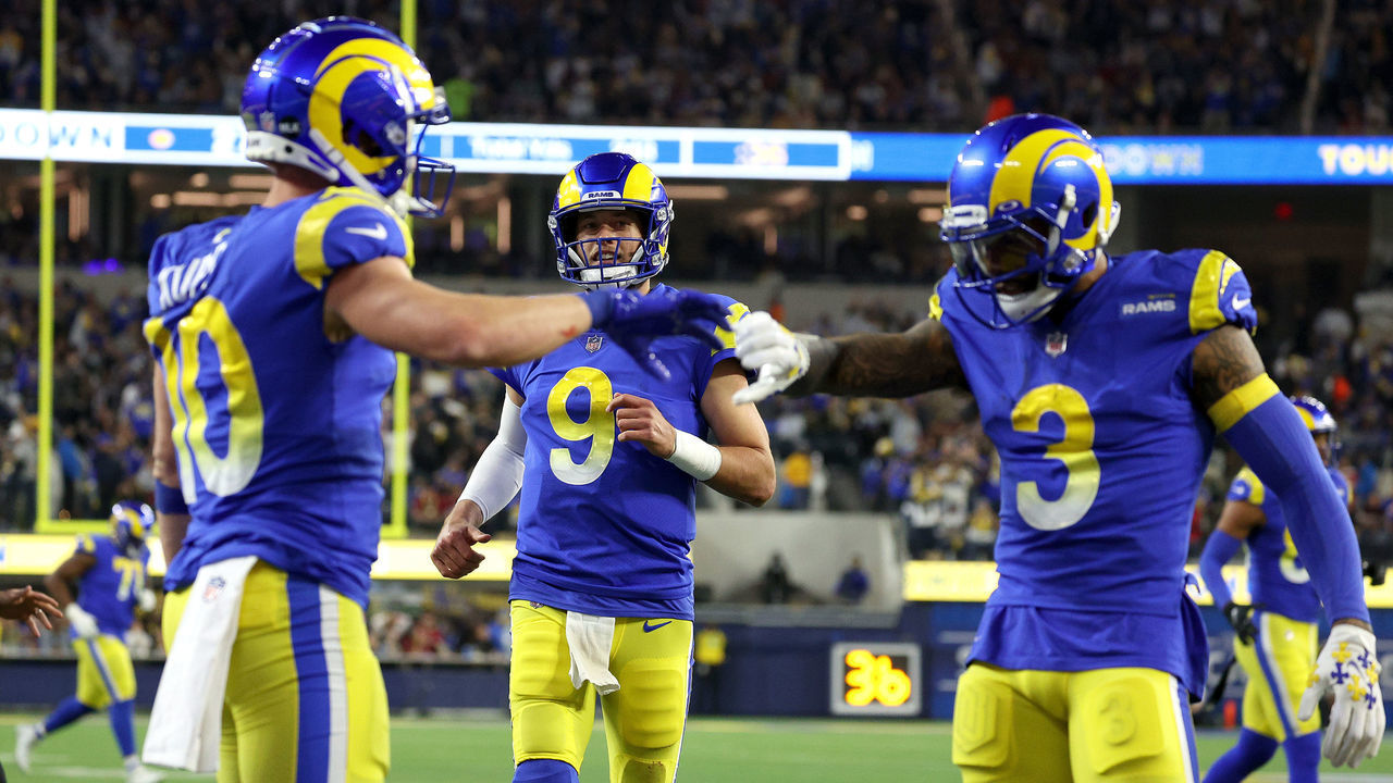 INGLEWOOD, CALIFORNIA - JANUARY 17: Matthew Stafford #9 of the Los Angeles Rams celebrates his touchdown pass to Cooper Kupp #10 of the Los Angeles Rams during the third quarter against the Arizona Cardinals in the NFC Wild Card Playoff game at SoFi Stadium on January 17, 2022 in Inglewood, California.