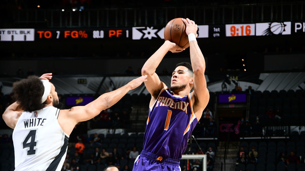 SAN ANTONIO, TX - JANUARY 17: Devin Booker #1 of the Phoenix Suns shoots the ball during the game against the San Antonio Spurs on January 17, 2022 at the AT&T Center in San Antonio, Texas. Mandatory Copyright Notice: Copyright 2022 NBAE (Photos by Michael Gonzales/NBAE via Getty Images)