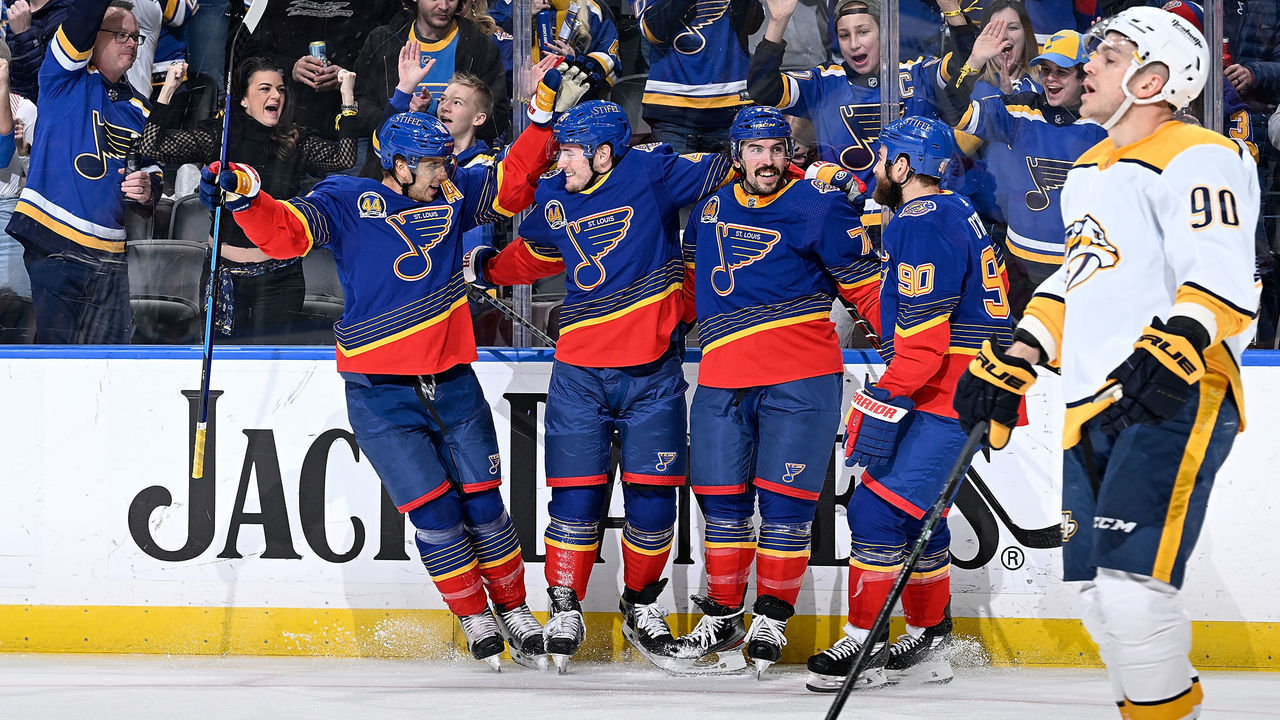 ST. LOUIS, MO - JANUARY 17: Ivan Barbashev #49 of the St. Louis Blues is congratulated after scoring a goal against the Nashville Predators at the Enterprise Center on January 17, 2022 in St. Louis, Missouri.