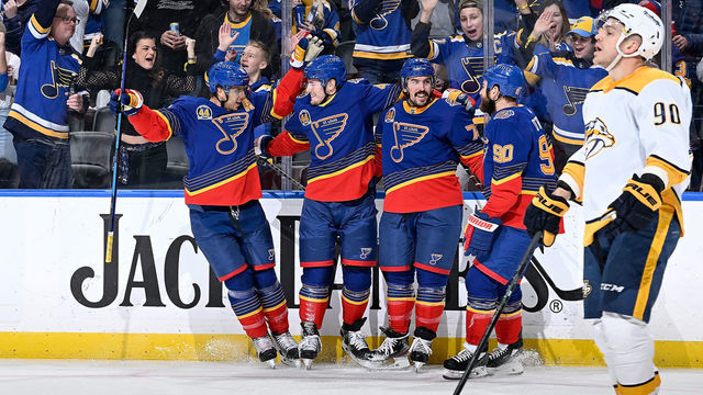 ST. LOUIS, MO - JANUARY 17: Ivan Barbashev #49 of the St. Louis Blues is congratulated after scoring a goal against the Nashville Predators at the Enterprise Center on January 17, 2022 in St. Louis, Missouri.