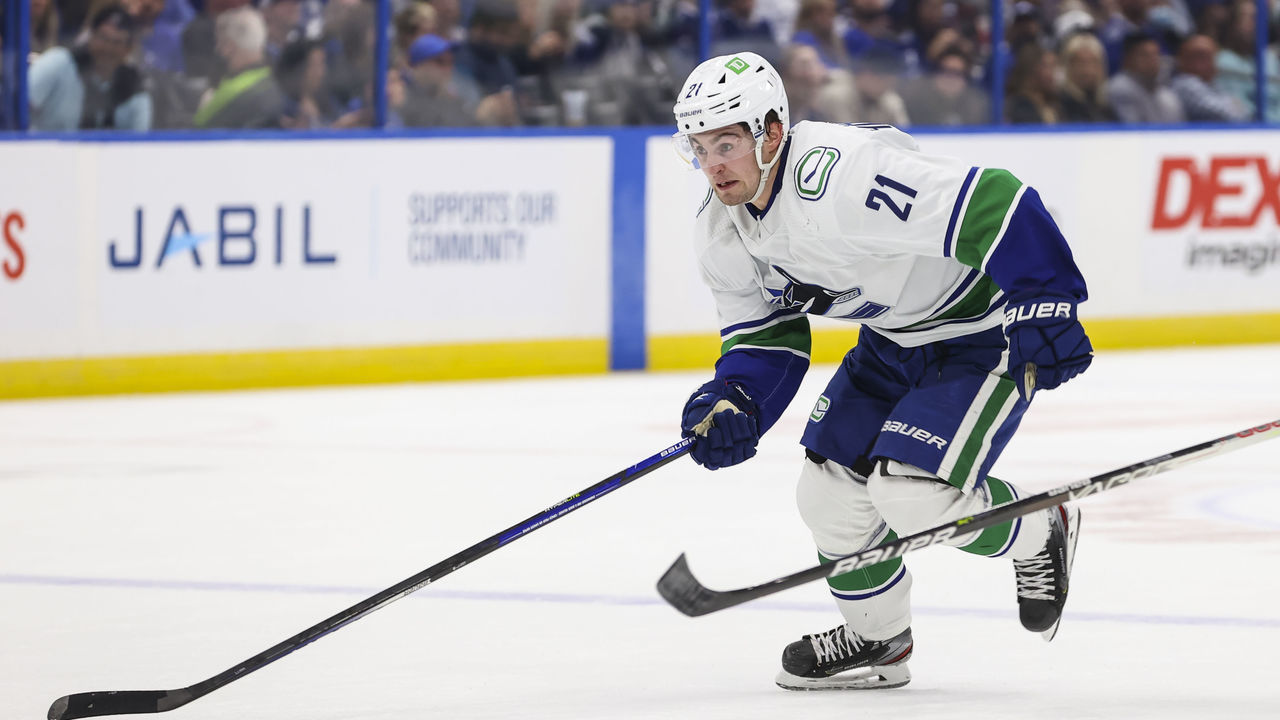 TAMPA, FL - JANUARY 13: Nils Hoglander #21 of the Vancouver Canucks during the second period against the Tampa Bay Lightning at Amalie Arena on January 13, 2022 in Tampa, Florida.