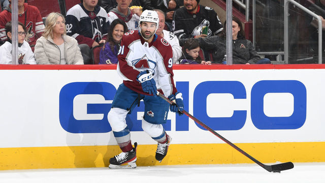 GLENDALE, ARIZONA - JANUARY 15: Nazem Kadri #91 of the Colorado Avalanche skates with the puck against the Arizona Coyotes at Gila River Arena on January 15, 2022 in Glendale, Arizona.