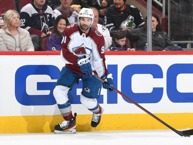 GLENDALE, ARIZONA - JANUARY 15: Nazem Kadri #91 of the Colorado Avalanche skates with the puck against the Arizona Coyotes at Gila River Arena on January 15, 2022 in Glendale, Arizona.