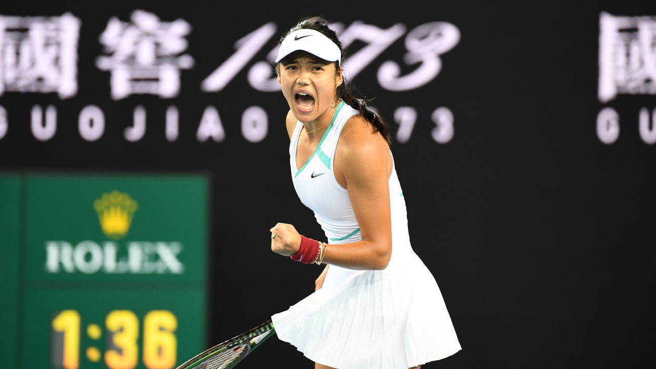 MELBOURNE, AUSTRALIA - JANUARY 18: Emma Raducanu of Great Britain celebrates winning a point during her first round singles match against Sloane Stephens of United States during day two of the 2022 Australian Open at Melbourne Park on January 18, 2022 in Melbourne, Australia.
