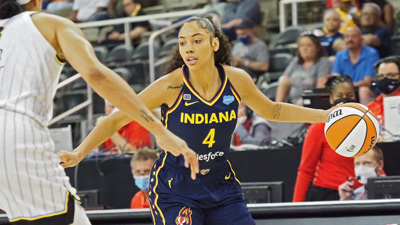 INDIANAPOLIS, IN - JUNE 12: Kysre Gondrezick #4 of the Indiana Fever dribbles during the game against the Chicago Sky on June 12, 2021 at Bankers Life Fieldhouse in Indianapolis, Indiana. Mandatory Copyright Notice: Copyright 2021 NBAE