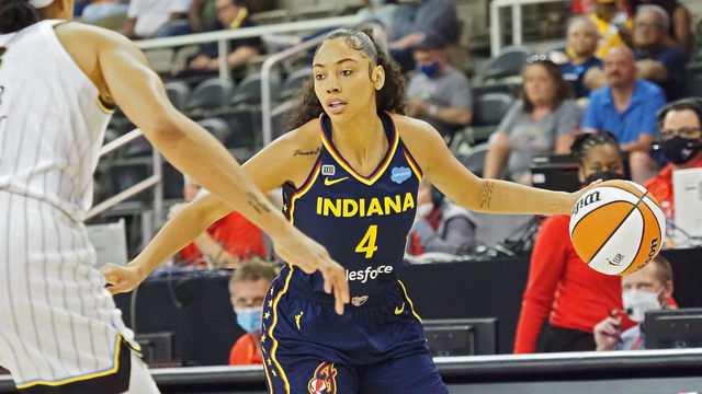 INDIANAPOLIS, IN - JUNE 12: Kysre Gondrezick #4 of the Indiana Fever dribbles during the game against the Chicago Sky on June 12, 2021 at Bankers Life Fieldhouse in Indianapolis, Indiana. Mandatory Copyright Notice: Copyright 2021 NBAE