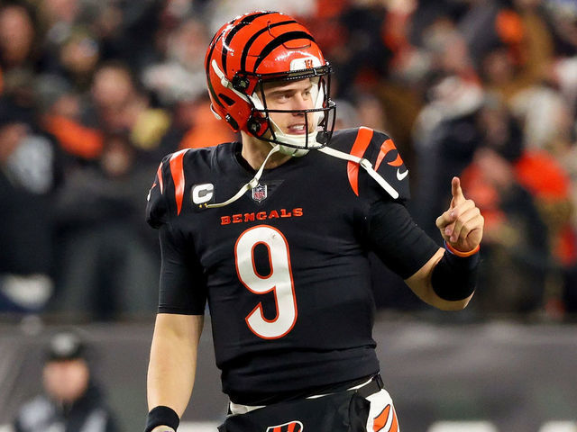 CINCINNATI, OHIO - JANUARY 15: Joe Burrow #9 of the Cincinnati Bengals celebrates in the fourth quarter against the Las Vegas Raiders during the AFC Wild Card playoff game at Paul Brown Stadium on January 15, 2022 in Cincinnati, Ohio.