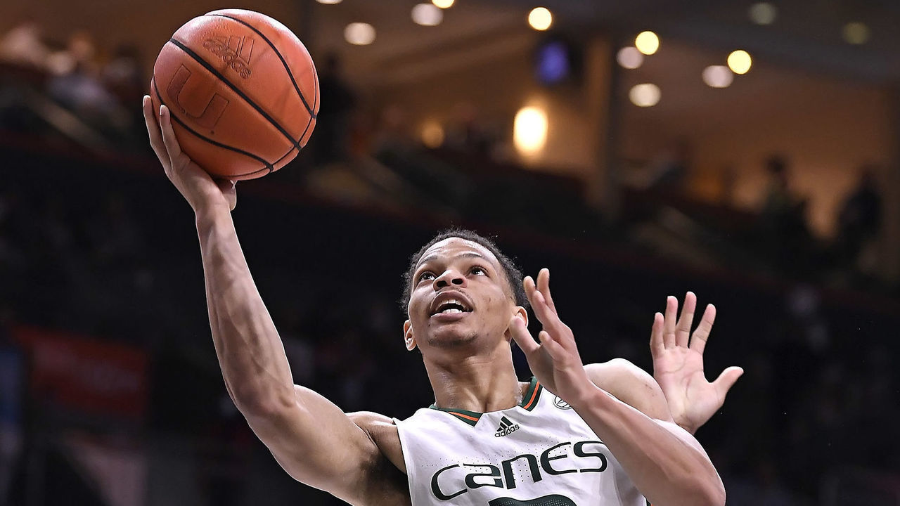 CORAL GABLES, FL - JANUARY 18: Miami guard Isaiah Wong (2) puts up a basket in the second half as the University of Miami Hurricanes faced the University of North Carolina Tar Heels on January 18, 2022, at the Watsco Center in Coral Gables, Florida.