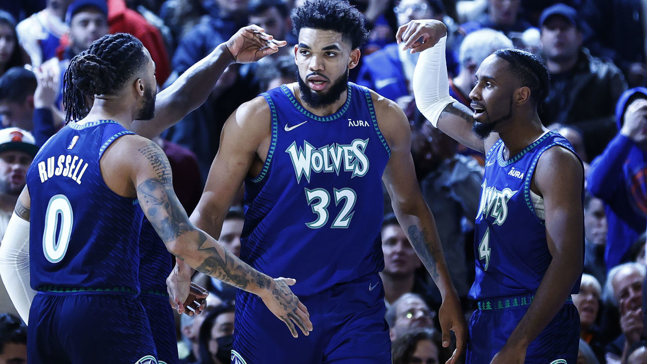 NEW YORK, NEW YORK - JANUARY 18: D'Angelo Russell #0, Karl-Anthony Towns #32, and Jaylen Nowell #4 of the Minnesota Timberwolves react during the second half against the New York Knicks at Madison Square Garden on January 18, 2022 in New York City. The Timberwolves won 112-110.