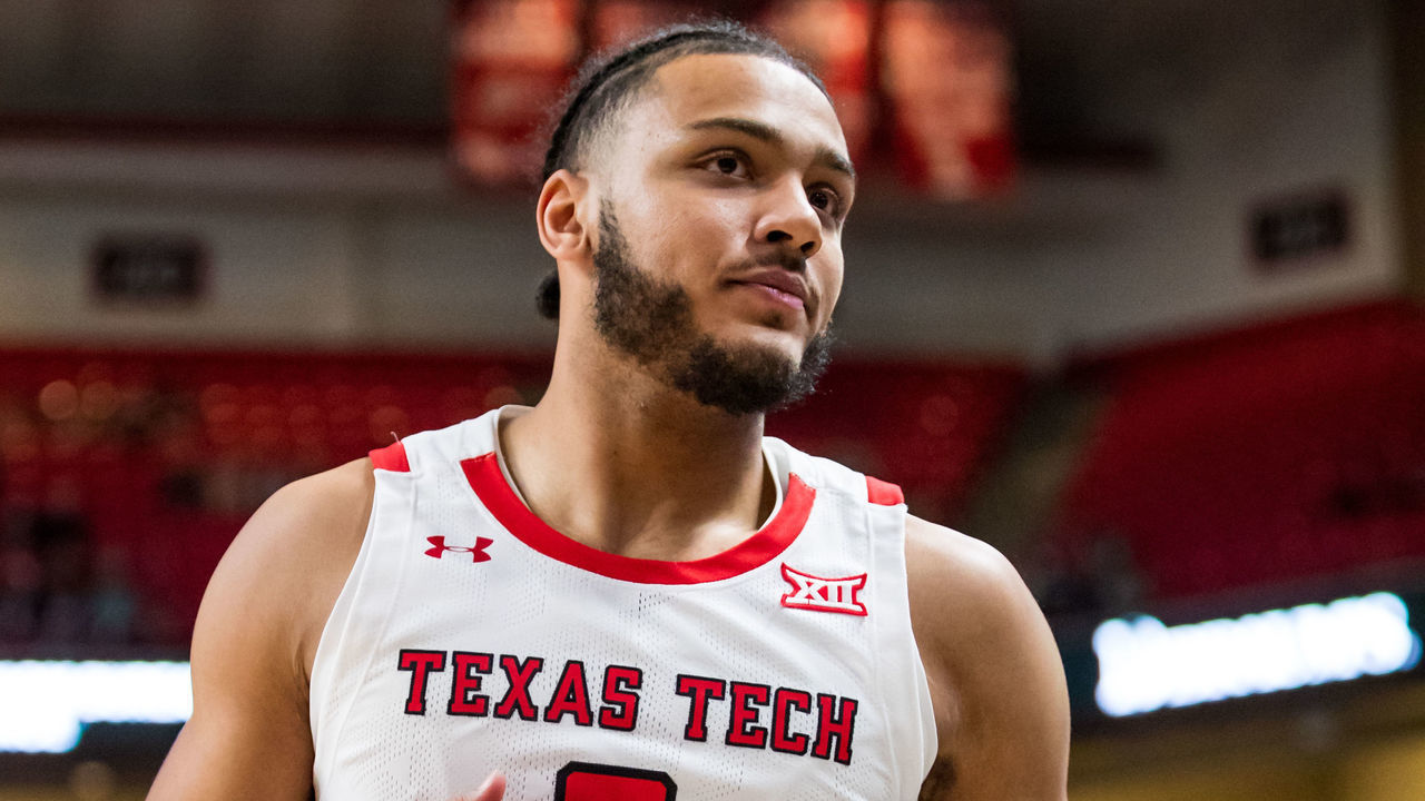 LUBBOCK, TEXAS - DECEMBER 28: Forward Kevin Obanor #0 of the Texas Tech Red Raiders stands on the court during the first half of the college basketball game against the Alabama State Hornets at United Supermarkets Arena on December 28, 2021 in Lubbock, Texas.