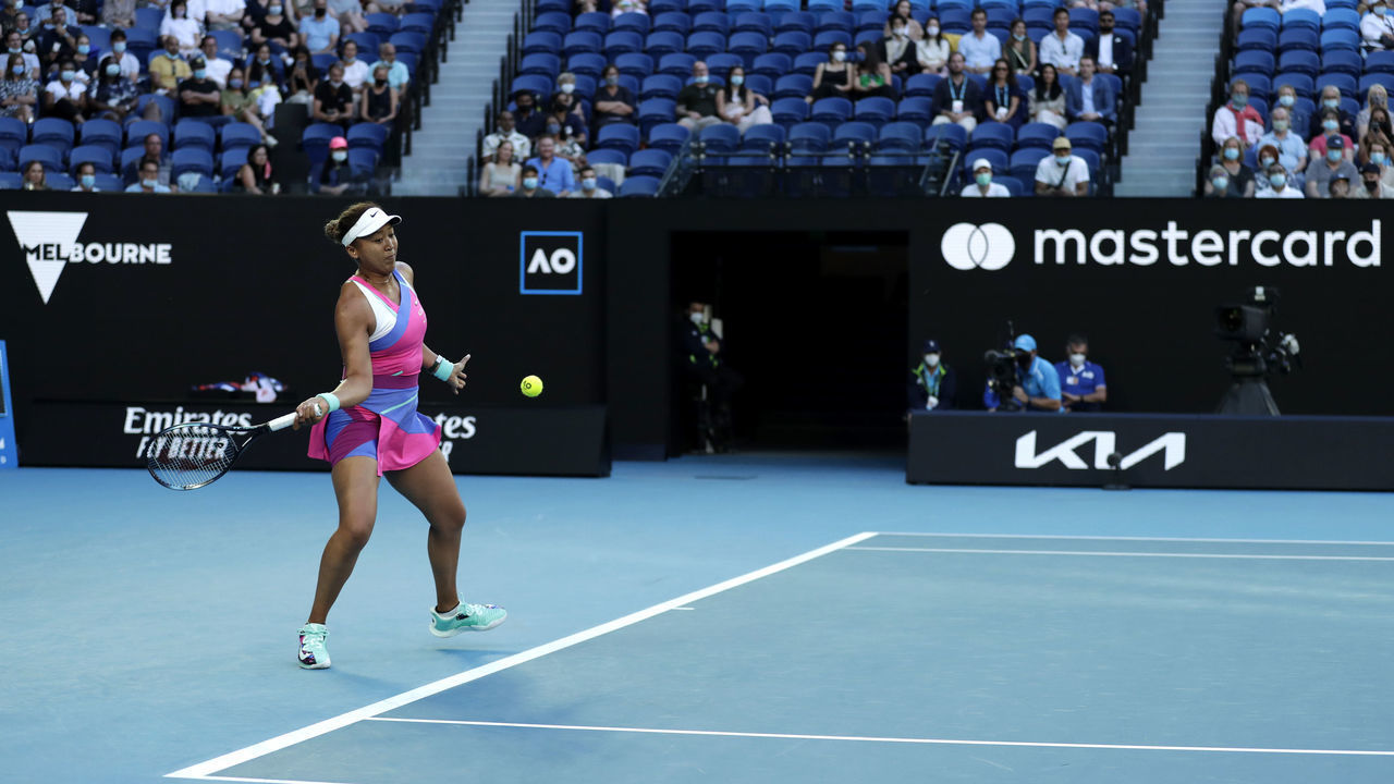 MELBOURNE, AUSTRALIA - JANUARY 19: Naomi Osaka of Japan plays a forehand in her second round singles match against Madison Brengle of United States during day three of the 2022 Australian Open at Melbourne Park on January 19, 2022 in Melbourne, Australia.