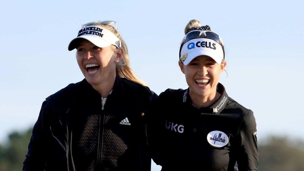 BELLEAIR, FLORIDA - NOVEMBER 14: Nelly Korda (R) is congratulated by her sister Jessica Korda following the final round of the Pelican Women's Championship at Pelican Golf Club on November 14, 2021 in Belleair, Florida. Nelly won the event with a birdie on the first play-off hole.