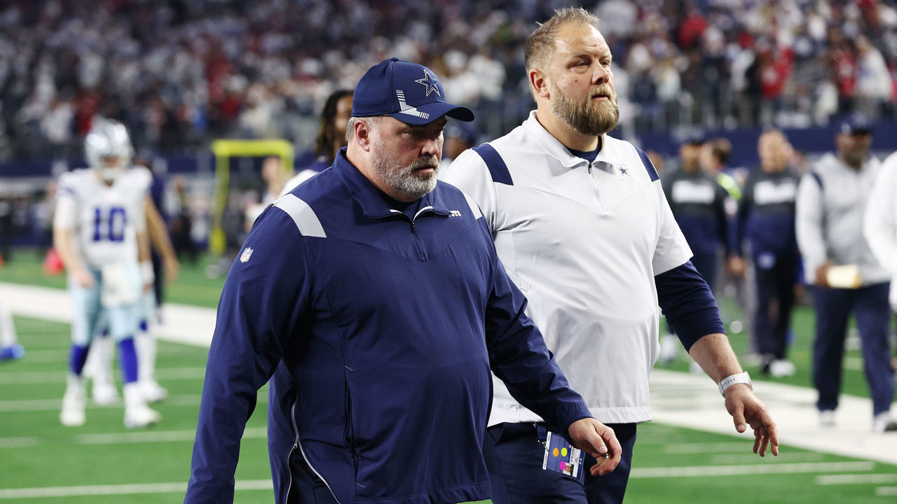 ARLINGTON, TEXAS - JANUARY 16: ead coach Mike McCarthy of the Dallas Cowboys walks off the field after losing to the San Francisco 49ers 23-17 in the NFC Wild Card Playoff game at AT&T Stadium on January 16, 2022 in Arlington, Texas.