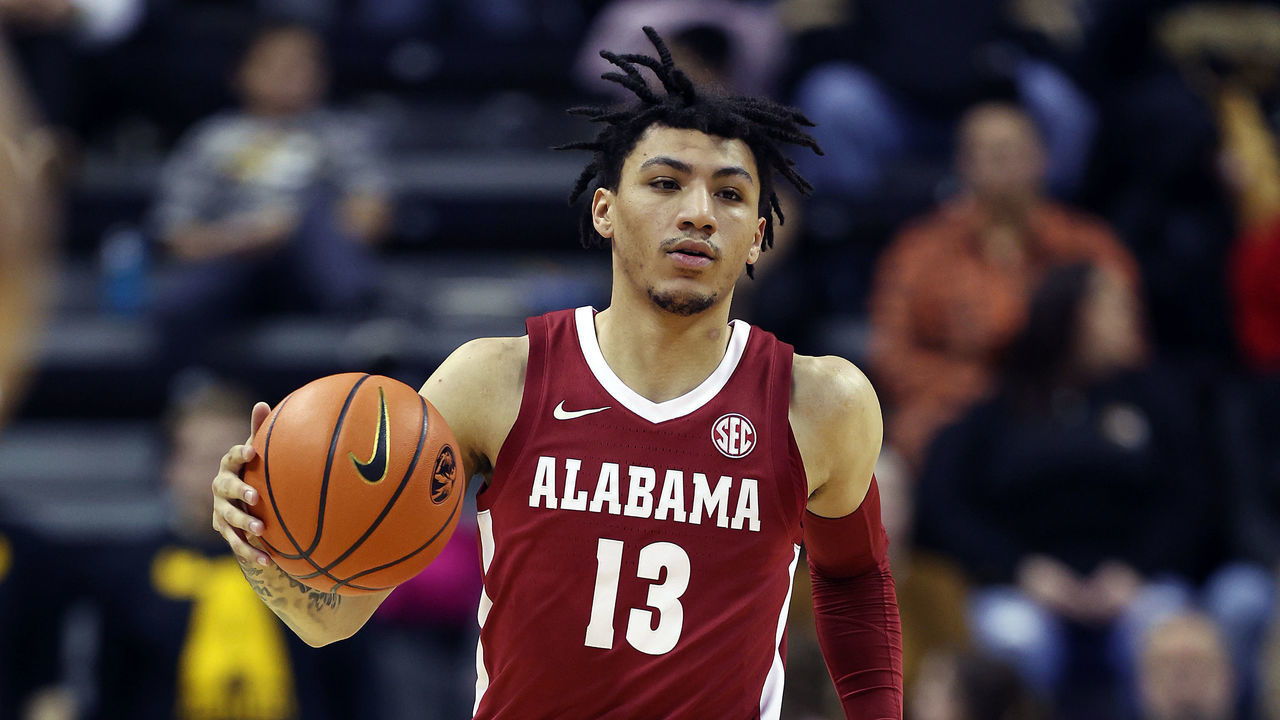 COLUMBIA, MISSOURI - JANUARY 08: Jahvon Quinerly #13 of the Alabama Crimson Tide controls the ball during the game against the Missouri Tigers at Mizzou Arena on January 08, 2022 in Columbia, Missouri.
