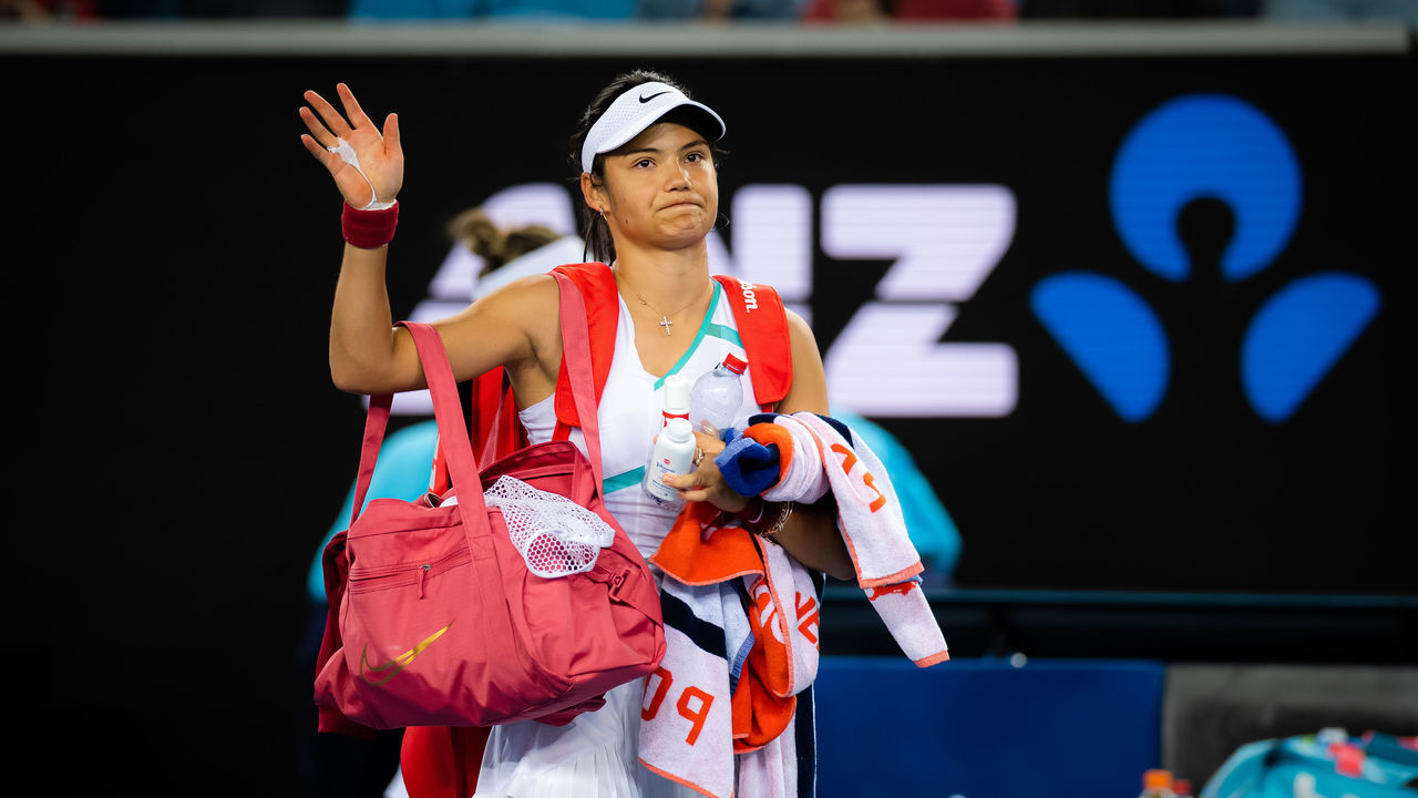 MELBOURNE, AUSTRALIA - JANUARY 20: Emma Raducanu of Great Britain walks off the court after losing her second round singles match against Danka Kovinic of Montenegro at the 2022 Australian Open at Melbourne Park on January 20, 2022 in Melbourne, Australia.