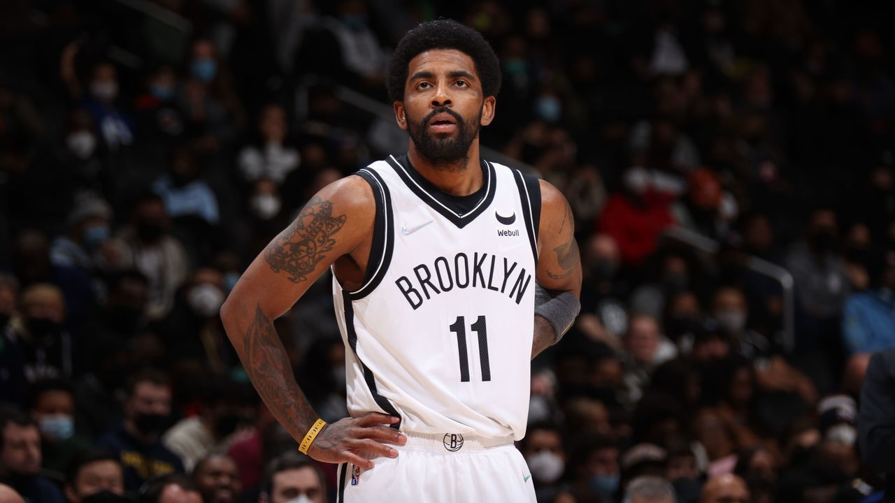 WASHINGTON, DC - JANUARY 19: Kyrie Irving #11 of the Brooklyn Nets looks on during the game against the Washington Wizards on January 19, 2022 at Capital One Arena in Washington, DC. Mandatory Copyright Notice: Copyright 2022 NBAE