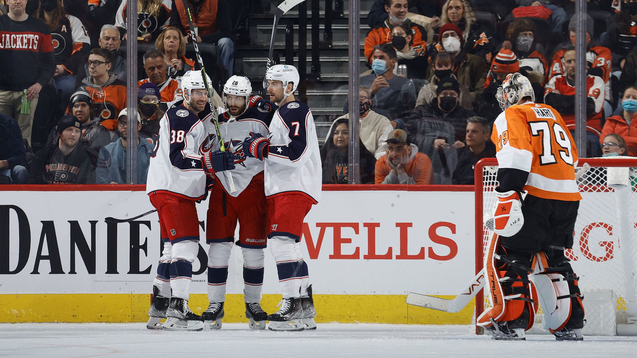 PHILADELPHIA, PENNSYLVANIA - JANUARY 20: (L-R) Boone Jenner #38, Oliver Bjorkstrand #28 and Sean Kuraly #7 of the Columbus Blue Jackets celebrate a goal by Bjorkstrand during the second period against the Philadelphia Flyers at Wells Fargo Center on January 20, 2022 in Philadelphia, Pennsylvania.