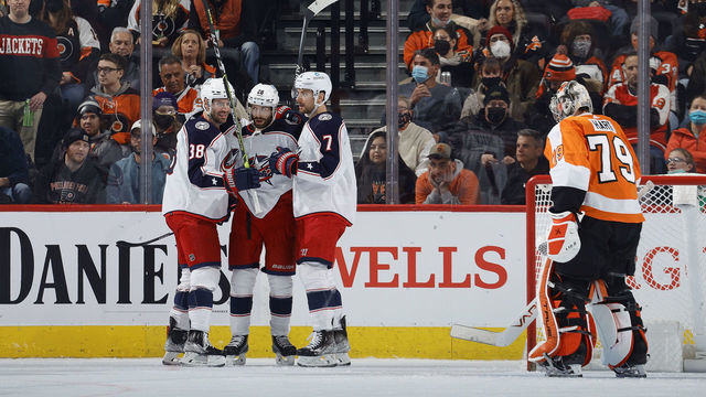 PHILADELPHIA, PENNSYLVANIA - JANUARY 20: (L-R) Boone Jenner #38, Oliver Bjorkstrand #28 and Sean Kuraly #7 of the Columbus Blue Jackets celebrate a goal by Bjorkstrand during the second period against the Philadelphia Flyers at Wells Fargo Center on January 20, 2022 in Philadelphia, Pennsylvania.