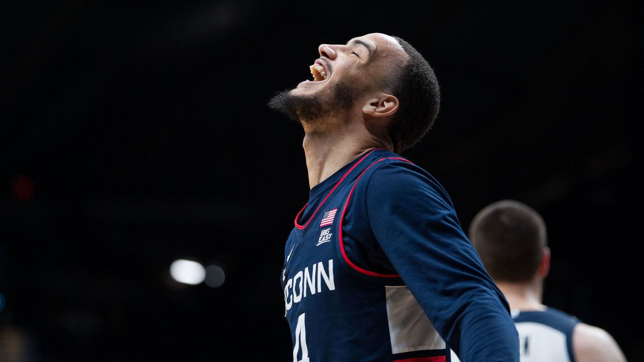 INDIANAPOLIS, IN - JANUARY 20: UConn Huskies guard Tyrese Martin (4) celebrates after a score during the mens college basketball game between the Butler Bulldogs and UConn Huskies on January 20, 2022, at Hinkle Fieldhouse in Indianapolis, IN.