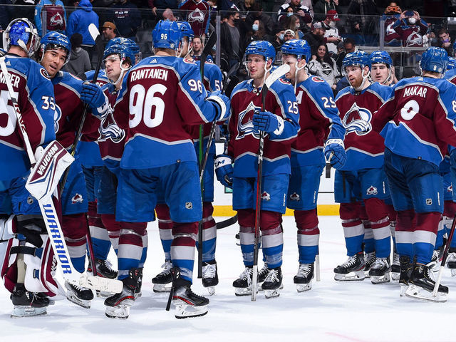 LOS ANGELES, CA - JANUARY 20: Darcy Kuemper #35 of the Colorado Avalanche celebrates their win with teammates against the Los Angeles Kings at Crypto.com Arena on January 20, 2022 in Los Angeles, California.