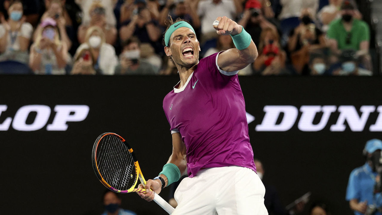 Spain's Rafael Nadal celebrates after winning the match against Russia's Karen Khachanov during their men's singles match on day five of the Australian Open tennis tournament in Melbourne on January 22, 2022. - -- IMAGE RESTRICTED TO EDITORIAL USE - STRICTLY NO COMMERCIAL USE --