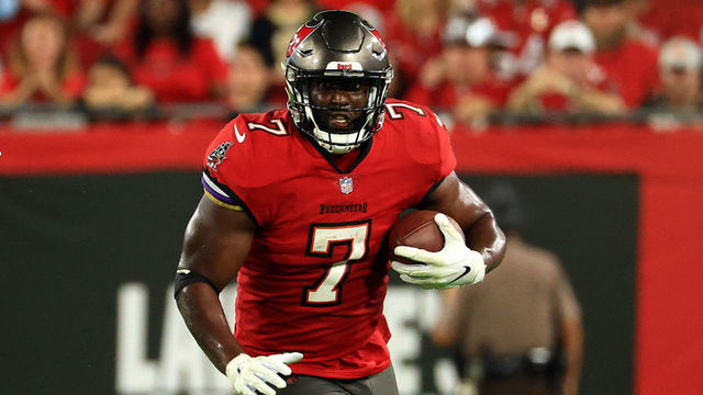 TAMPA, FLORIDA - DECEMBER 19: Leonard Fournette #7 of the Tampa Bay Buccaneers carries the ball during the 2nd quarter of the game against the New Orleans Saints at Raymond James Stadium on December 19, 2021 in Tampa, Florida.