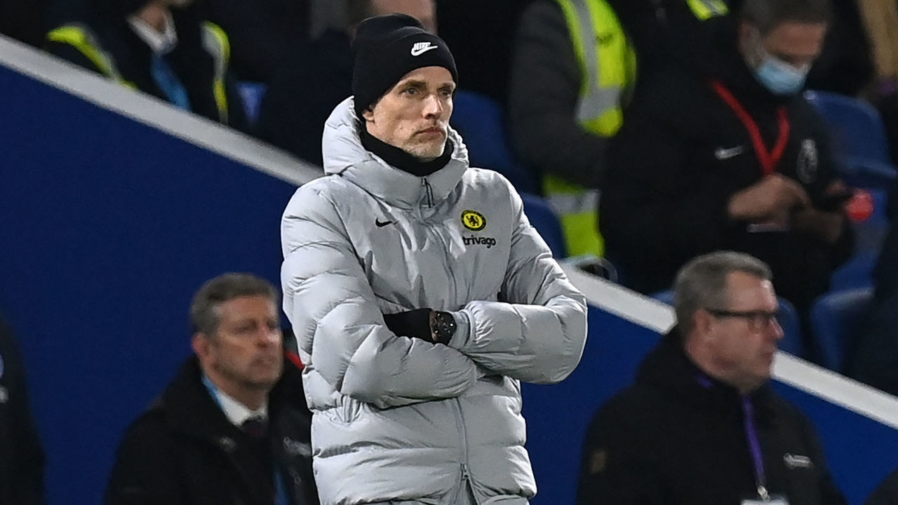 Chelsea's German head coach Thomas Tuchel looks on during the English Premier League football match between Brighton and Hove Albion and Chelsea at the American Express Community Stadium in Brighton, southern England on January 18, 2022. - RESTRICTED TO EDITORIAL USE. No use with unauthorized audio, video, data, fixture lists, club/league logos or 'live' services. Online in-match use limited to 120 images. An additional 40 images may be used in extra time. No video emulation. Social media in-match use limited to 120 images. An additional 40 images may be used in extra time. No use in betting publications, games or single club/league/player publications.