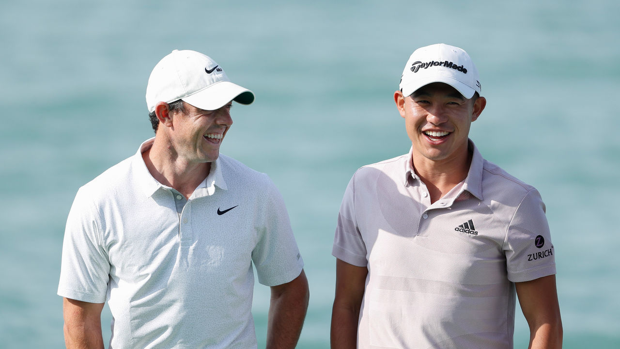 ABU DHABI, UNITED ARAB EMIRATES - JANUARY 18: Rory McIlroy of Northern Ireland and Collin Morikawa of the USA react as they pose for a photo prior to the Abu Dhabi HSBC Championship at Yas Links Golf Course on January 18, 2022 in Abu Dhabi, United Arab Emirates.