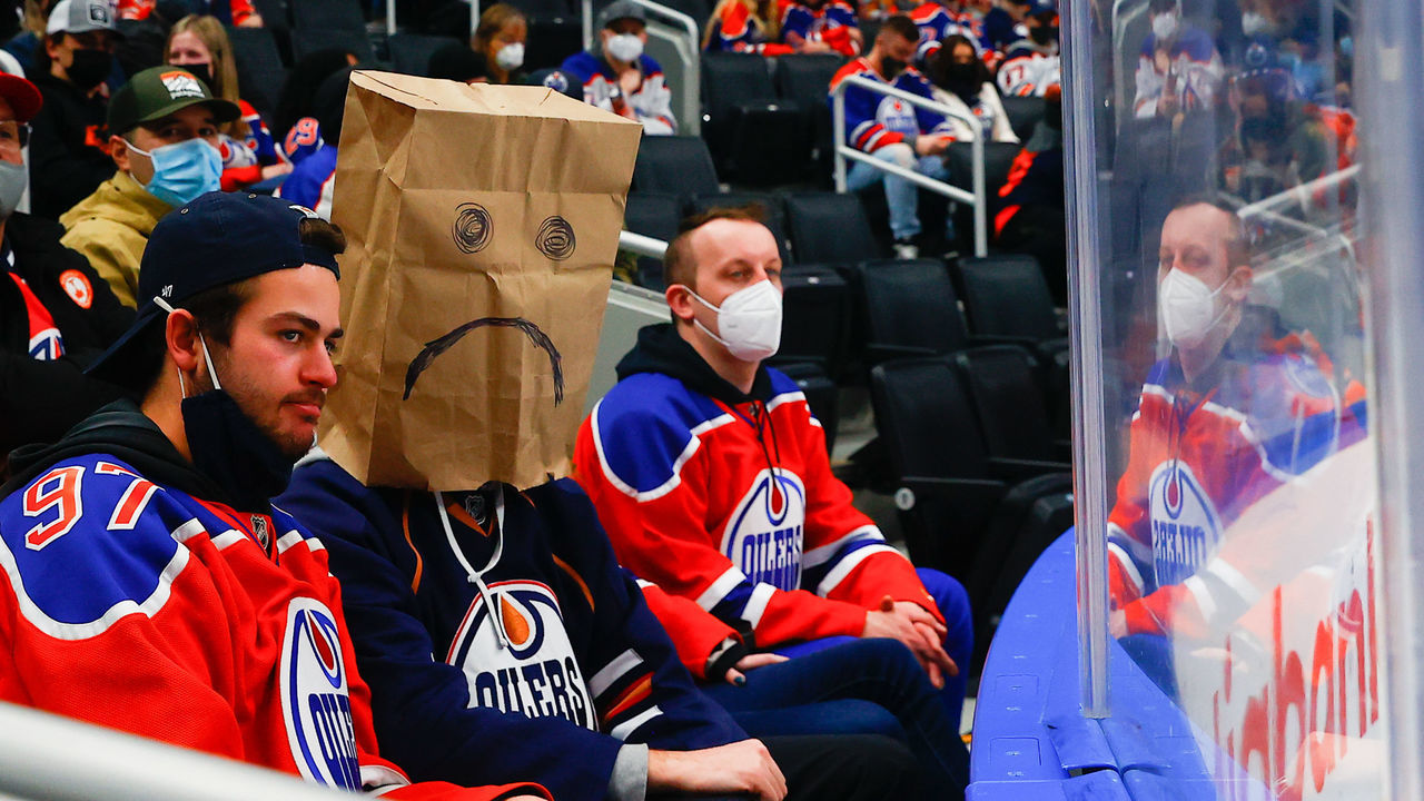 EDMONTON, AB - JANUARY 20: An Oilers fan shows his displeasure with the teams losing streak in the third period during the Edmonton Oilers game versus the Florida Panthers on January 20, 2022 at Rogers Place in Edmonton, AB.