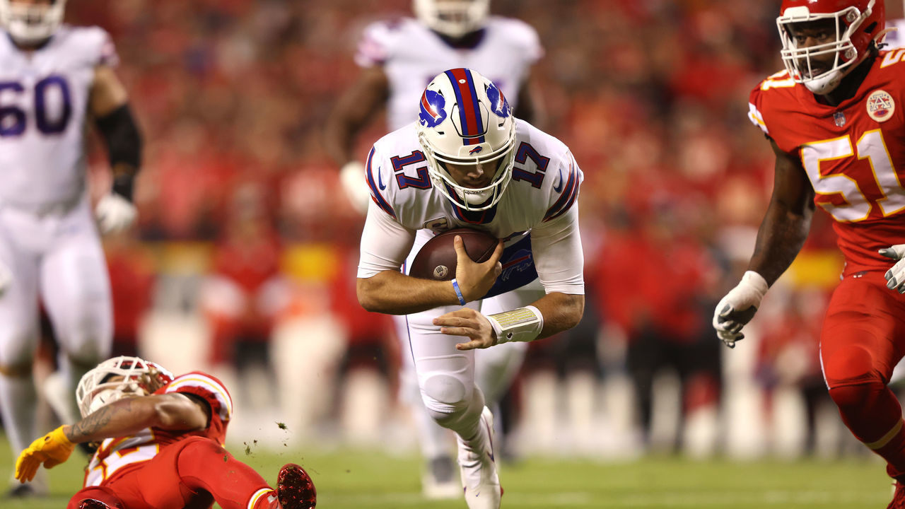 KANSAS CITY, MISSOURI - OCTOBER 10: Josh Allen #17 of the Buffalo Bills is tackled by Tyrann Mathieu #32 of the Kansas City Chiefs during the first half of a game at Arrowhead Stadium on October 10, 2021 in Kansas City, Missouri.