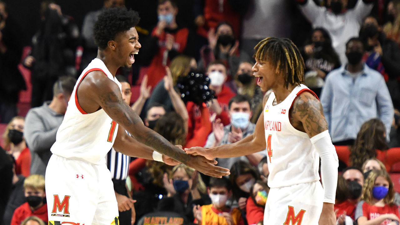 COLLEGE PARK, MARYLAND - JANUARY 21: Hakim Hart #13 and Fatts Russell #4 of the Maryland Terrapins celebrate a win after a college basketball game against the Illinois Fighting Illini at the XFinity Center on January 21, 2022 in College Park, Maryland.